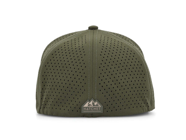 Hunter Green colored Rover premium performance fitted hat from Hatchet Headwear pictured with a white foreground and background.  Hat features a color matched Hunter Green rear rubber logo patch with the Hatchet Headwear logo (mountains, tent, and  hatchet above the word "HATCHET) in taupe.  The hat is photographed from the rear to depict the fitted nature of the hat and stylish Hatchet Headwear logo on the back of the hat.  Also prominently featured are the diamond shaped laser perforations.